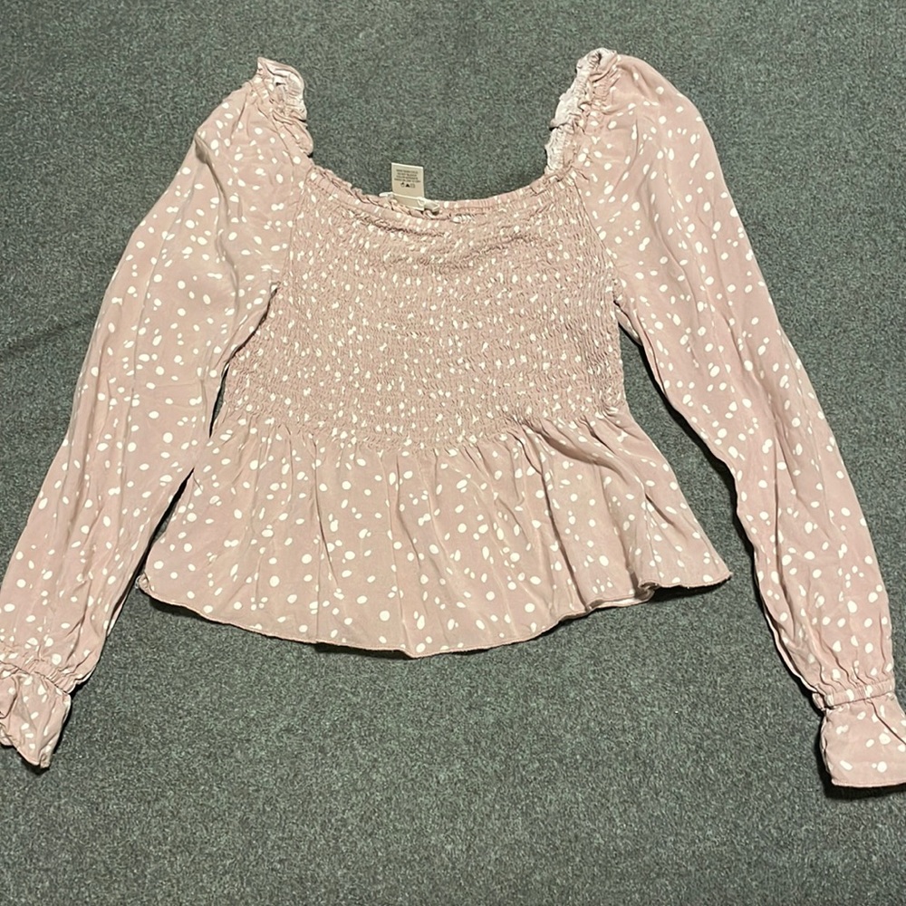 Pink peplum top